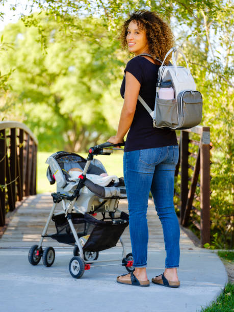 istock Young Mother in the Park 1039184122