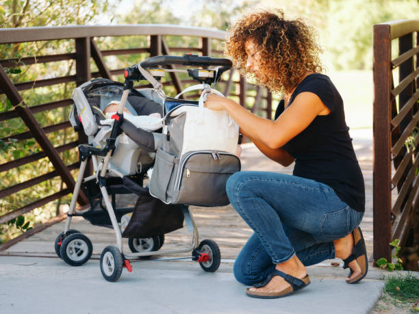 istock Young Mother in the Park 1039184330