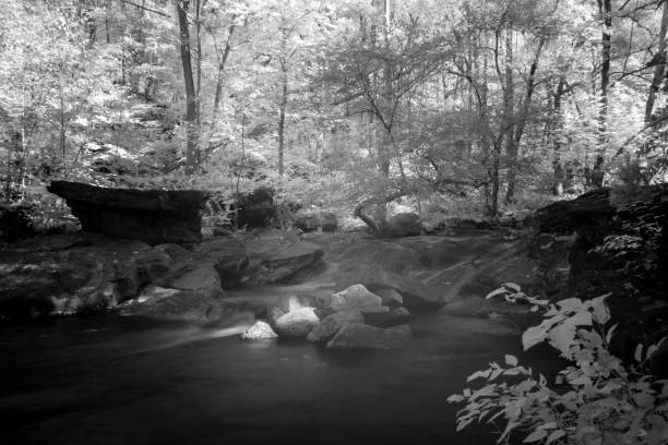istock Waterfall On Fresh Water Stream In Infrared Spectrum 1039188784