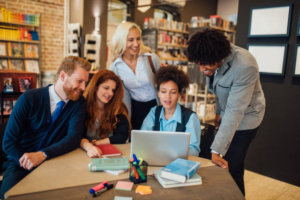istock Group of people working in the library 1039199454