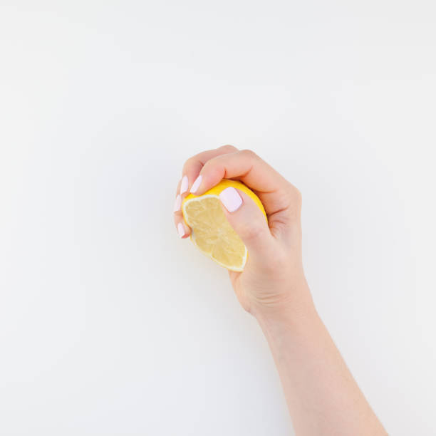 istock Woman hand with lemon 1039202284