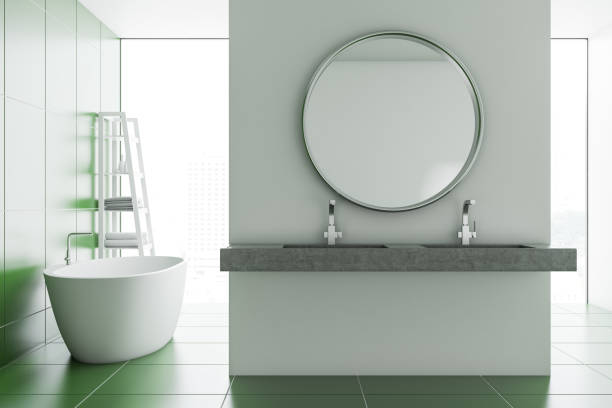 istock Round mirror bathroom interior, tub and sink 1039203120