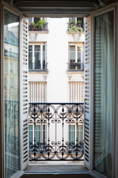 istock Shutters Opening onto Balcony in Parisian Home 1039209040