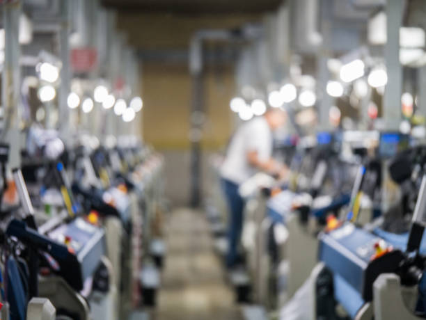istock Weaving loom machines in textile factory 1039226208