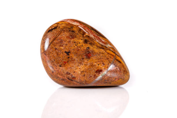 istock Macro mineral stone jasper on a white background 1039236396