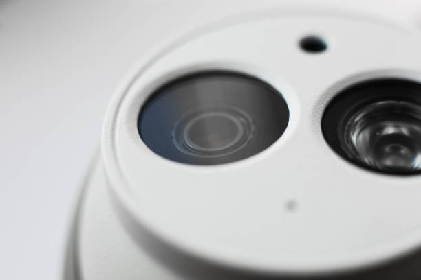 istock White security cctv dome type camera close-up. Lens and ir 1039240250