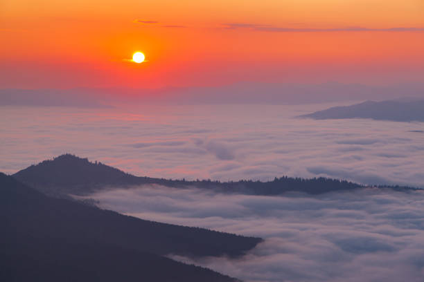 istock Sunrise in golden hour over the mountains 1039250084