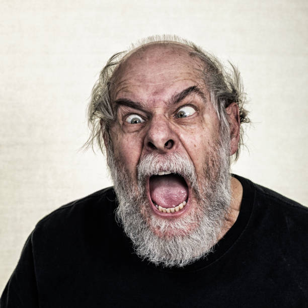 istock Screaming Staring Seriously Disturbed Senior Adult Man 1039281138