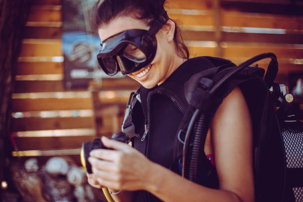 Woman diver preparing to dip