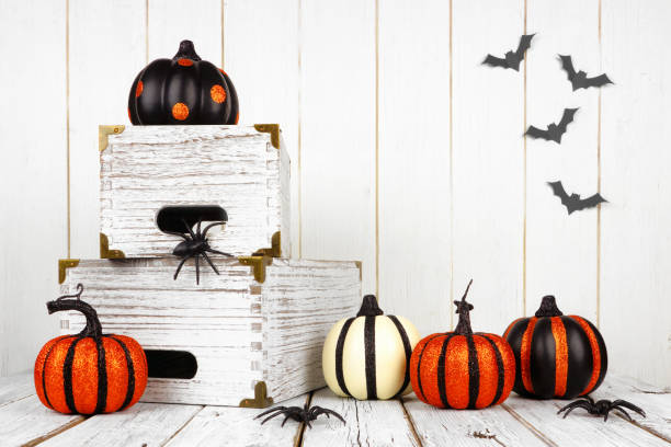 istock Halloween decor against a white wood background 1039286490