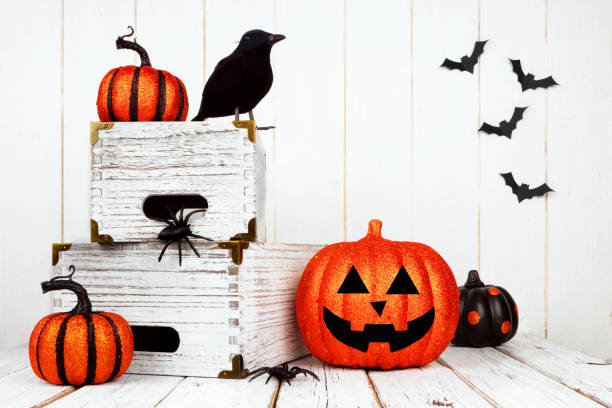 istock Halloween decor against a white wood background 1039286502