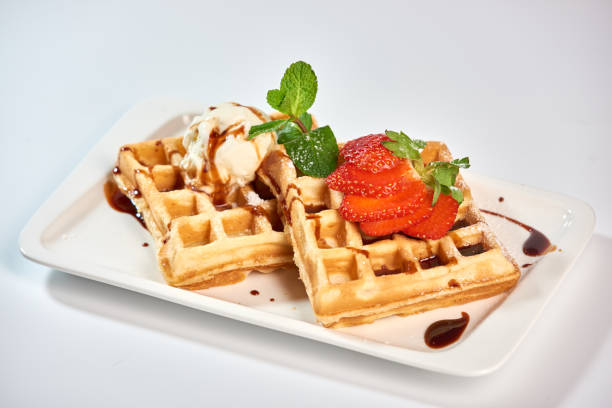 istock Belgian waffles with strawberries. 1039290826