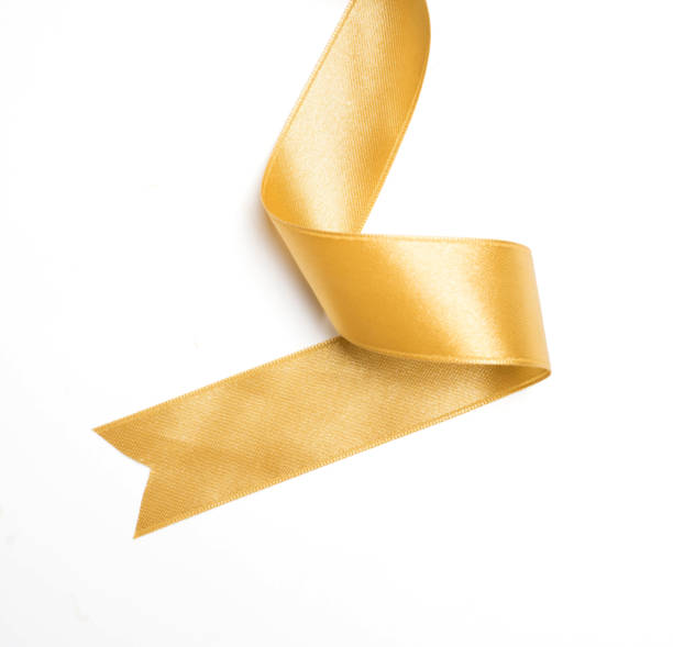istock Gold ribbon in roll on white background 1039293416
