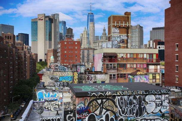 New York, USA - August 23, 2018: Mural art at on Manhattan Buildings in southern Manhattan, New York, Street themed mural is art's many places in New York are famous for their murales.