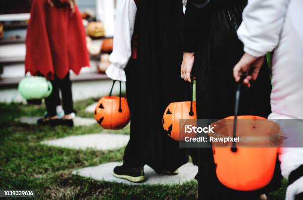 Little Children In Halloween Costumes Stock Photo - Download Image Now - Trick Or Treat, Halloween, Candy