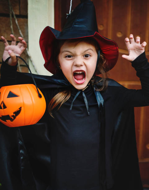 istock Little girl dressed up as a witch 1039331820
