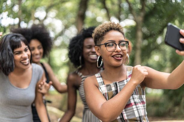 istock Multiracial Young Friends Group Taking Selfies And Have Fun Together 1039332438