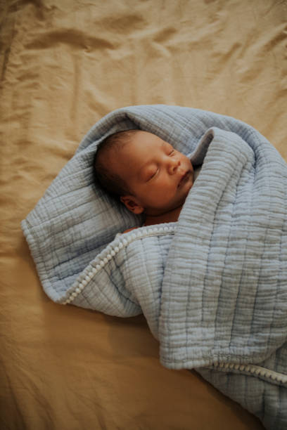 istock Infant baby fast asleep on the bed 1039336038