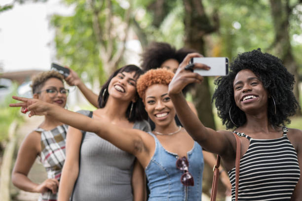 istock Multiracial Young Friends Group Taking Selfies And Have Fun Together 1039343326