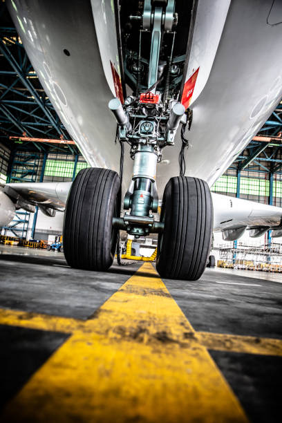 istock Airplane in Hangar and landing gear 1039352218
