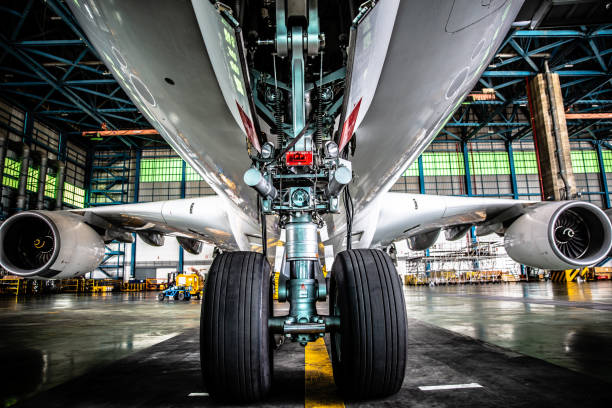Airplane in Hangar and landing gear Airplane in Hangar and landing gear air vehicle stock pictures, royalty-free photos & images