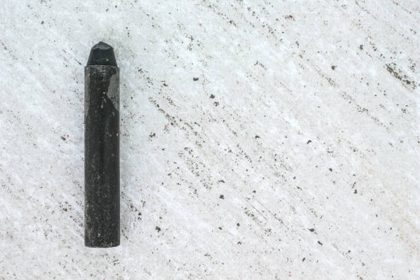istock black crayon drawings on white paper background texture 1039411860