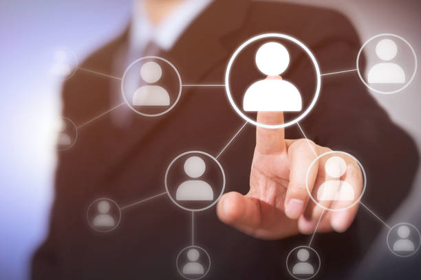 istock Businessman pressing modern social buttons on a virtual background. 1039444728