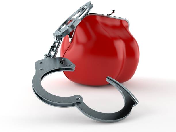 istock Purse with handcuffs 1039454184