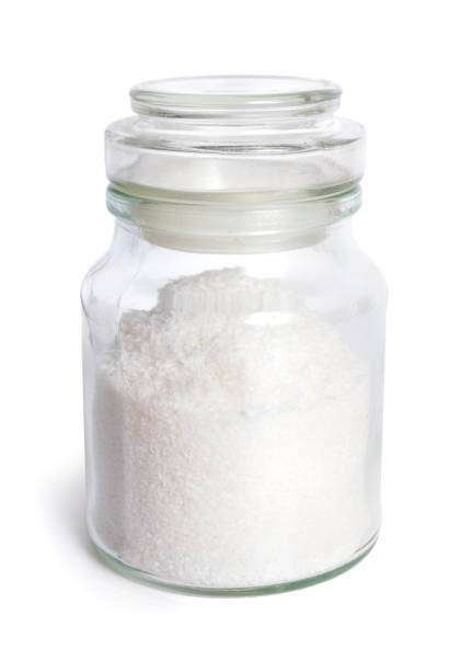 istock Jar with grated coconut isolated on white background 1039462442
