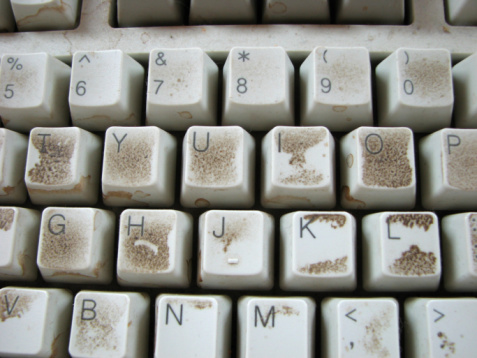 old nasty dirty white computer keyboard letter keys