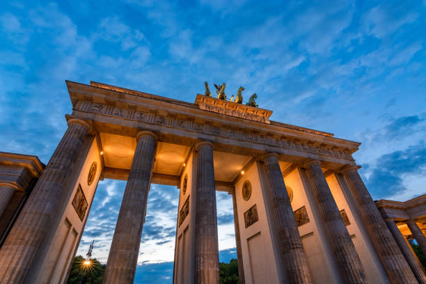 istock The lit Brandenburg Gate in Berlin during the blue hour 1039485460