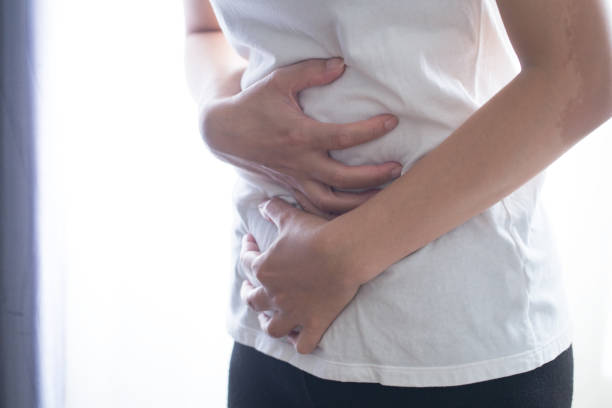 istock Woman Stomach Ache 1039485652