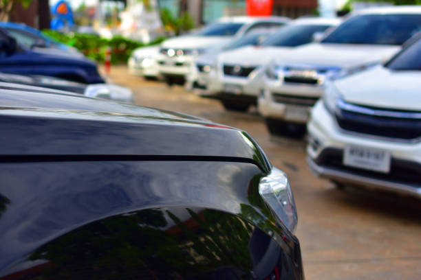 istock Car parked row on street 1039486876
