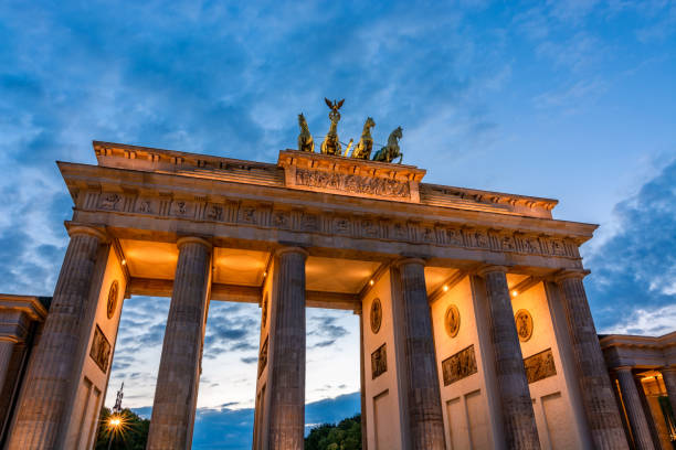 istock The lit Brandenburg Gate in Berlin during the blue hour 1039487014