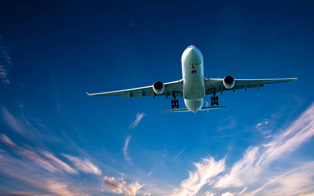istock Aircraft in flight with Cirrus cloud in blue sky. Australia. 1039493800