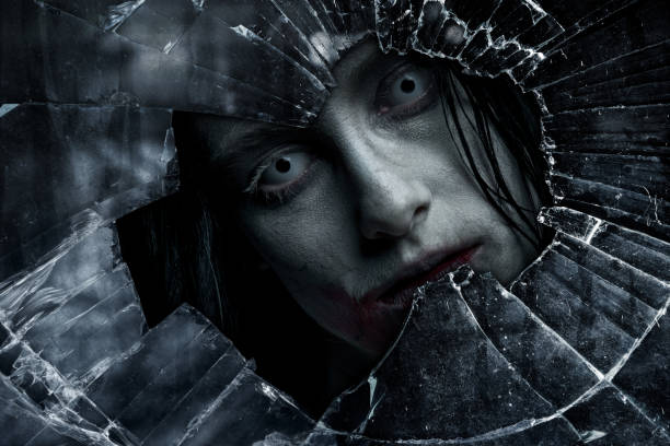 zombi - broken window glass women fotografías e imágenes de stock