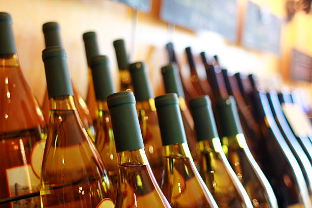 istock Rows of White Wine Bottles - Natural Light 103950127