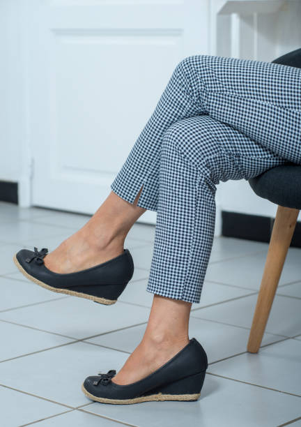 istock a woman legs with checkered pants 1039513570
