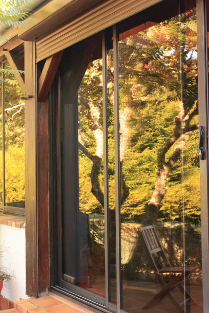 istock Wooden frame veranda  Waterproof glass facade 1039517134