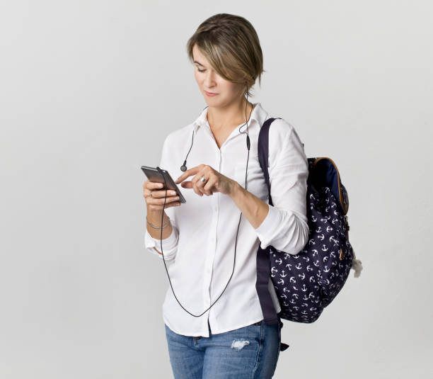 istock Beautiful and charming female student checking social media 1039521968