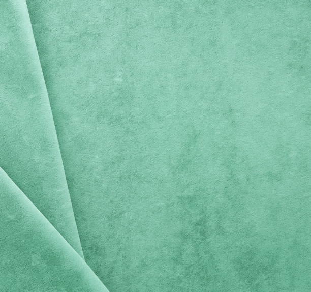 istock velvet background, texture, pastel green colors, expensive luxury,  fabric, material, needlework, sewing, wallpaper, cloth 1039526436