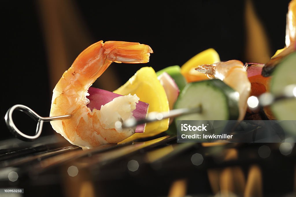 Shrimp and vegetable skewer on grill closeup  Barbecue - Meal Stock Photo