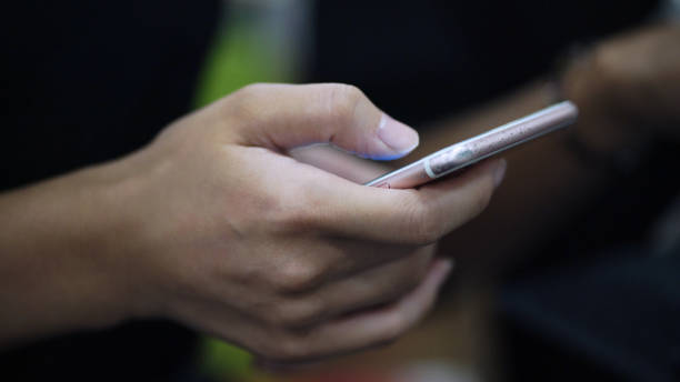 istock Young Businessman Using Smartphone 1039537570