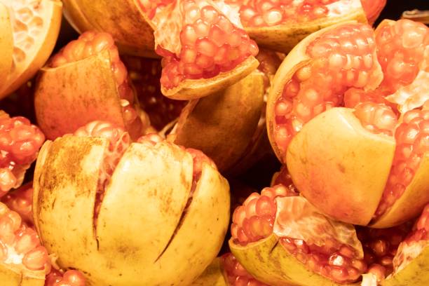 istock Pomegranates and pomegranate seeds 1039538852