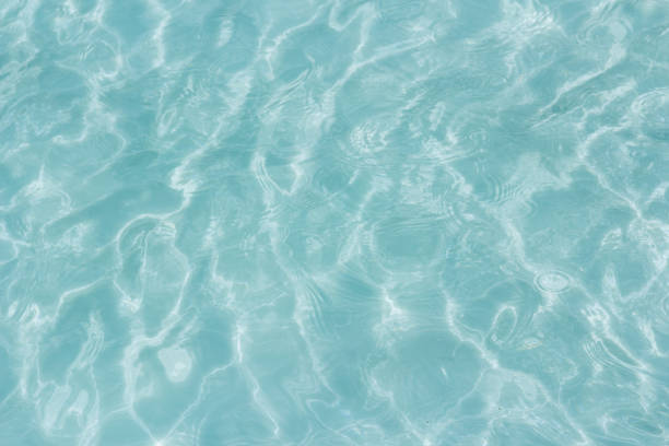 istock Shining light and reflections of blue water 1039539182