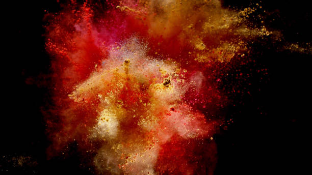 istock Explosion of coloured powder on black background. 1039539772