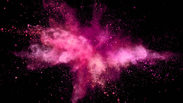 istock Explosion of coloured powder on black background. 1039539844