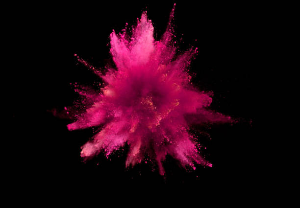 istock Explosion of coloured powder on black background. 1039540152