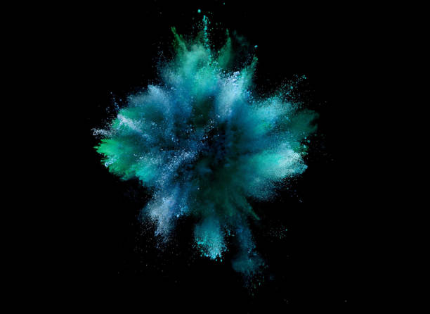 istock Explosion of coloured powder on black background. 1039540376