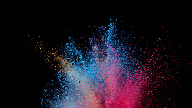 istock Explosion of coloured powder on black background. 1039540414